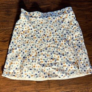 Skirt on creamed background.